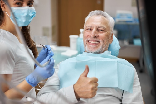Snap-on Dentures in Tampa, FL | Mini Dental Implants | Dr. Cabrera